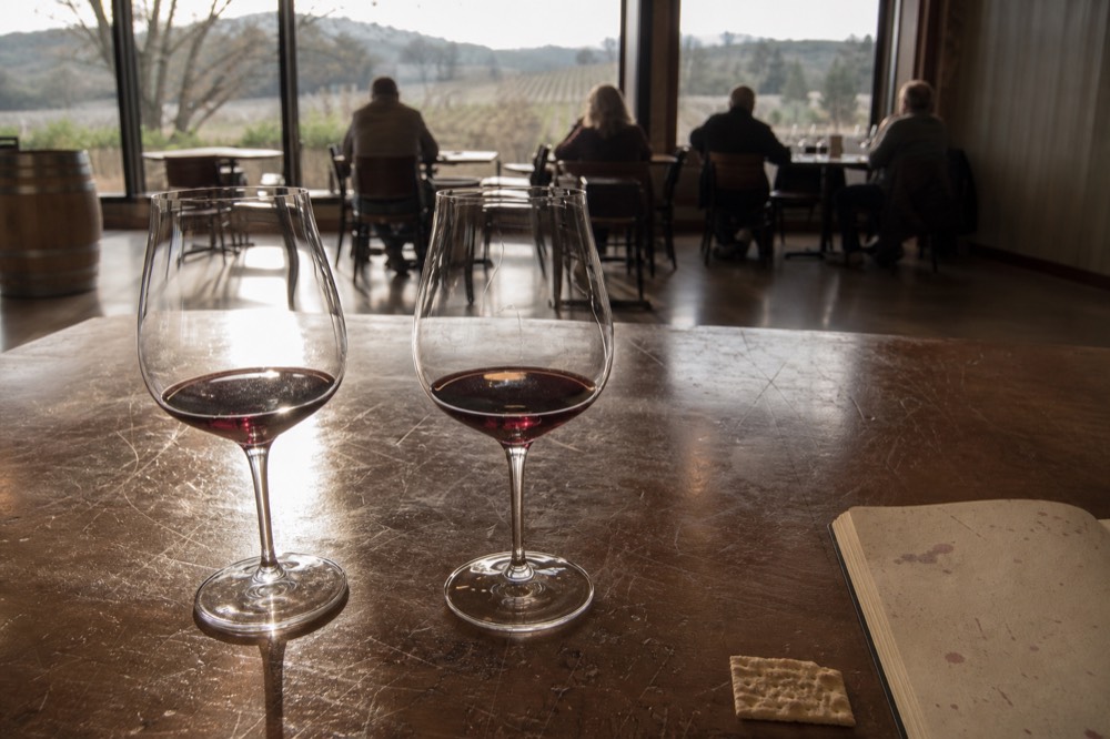 Glasses of Pinot Noir on a Willamette Valley tasting room table