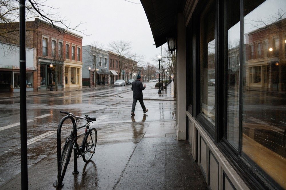 Small-town main street in McMinnville Oregon lined with storefronts